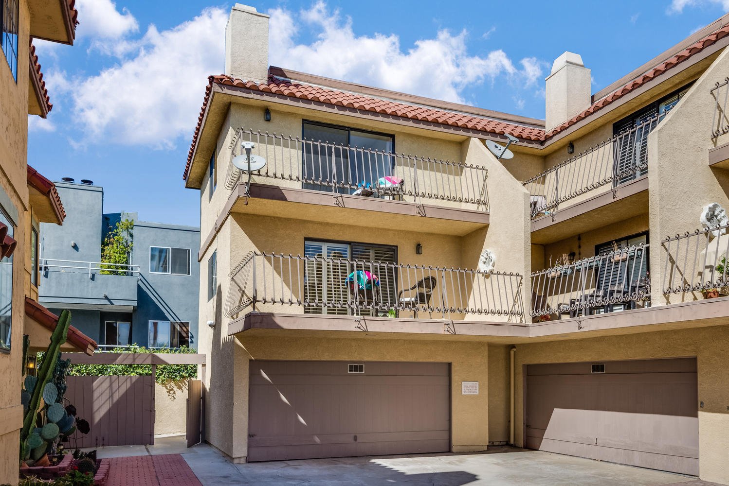 Apartment building in Southern California illustrating rising property operating expenses driven by maintenance, utilities, and regulatory costs