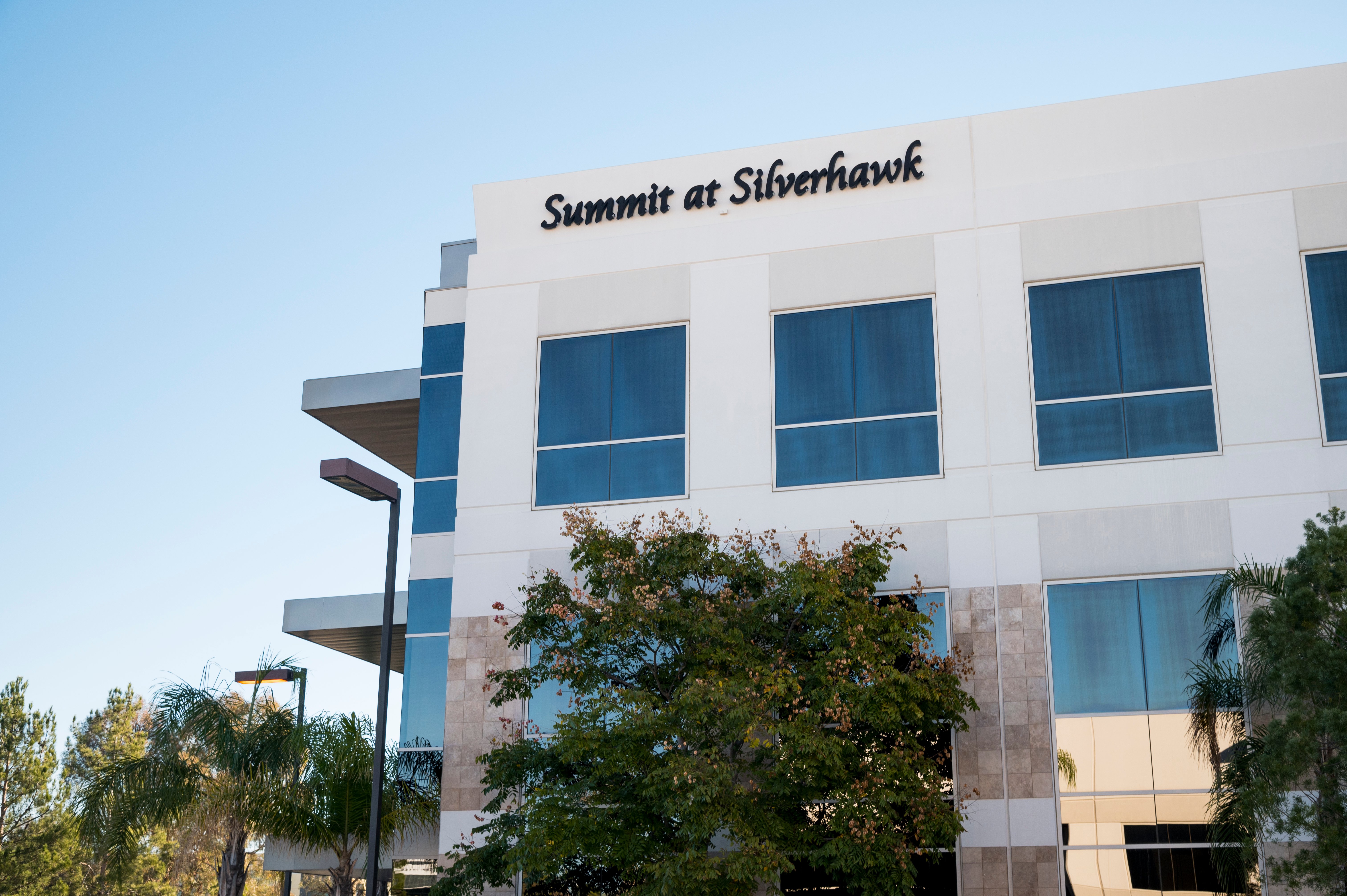 Exterior of the Summit at Silverhawk commercial office building and landscaping.