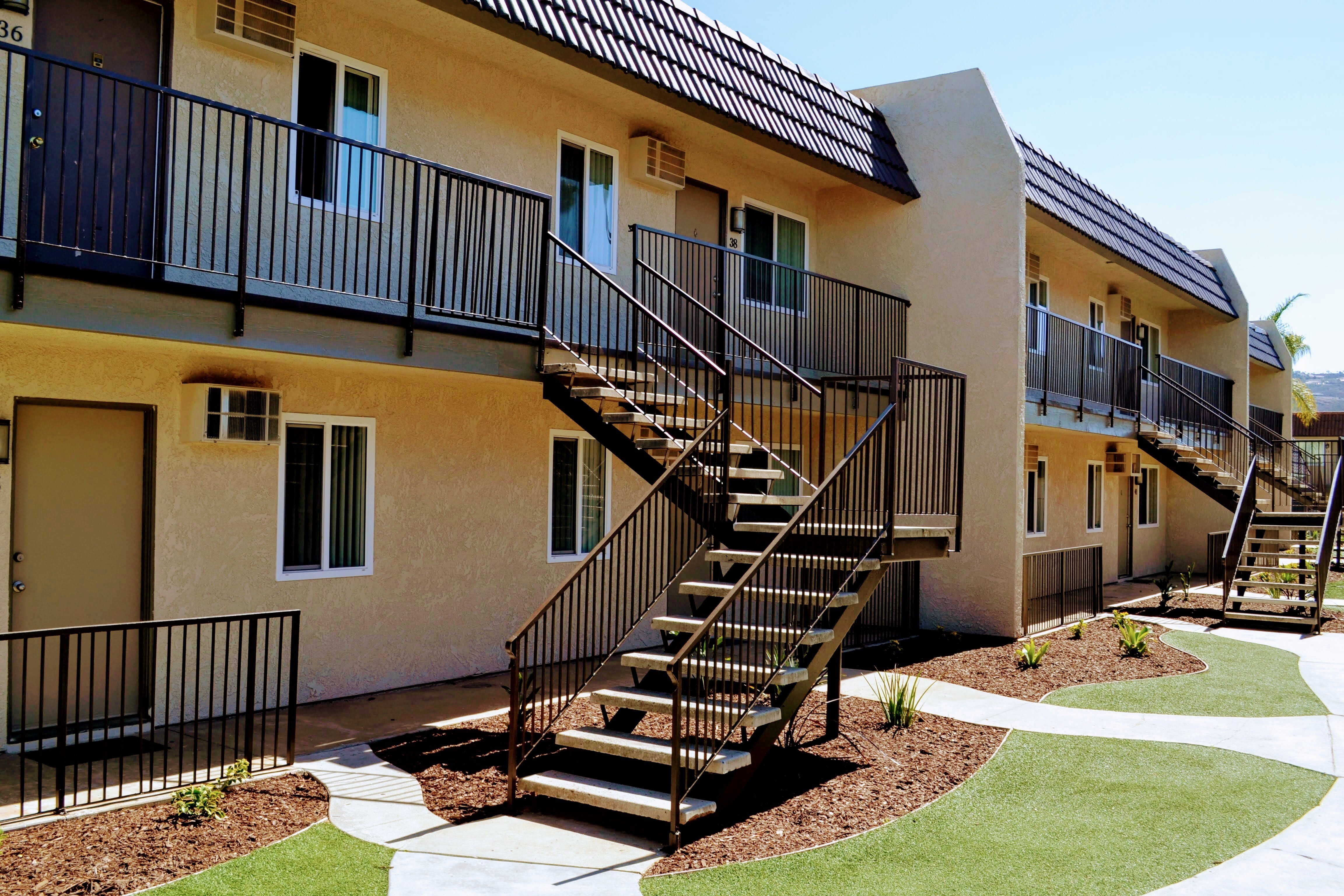 Exterior stairs, walkways, and apartment buildings at Meadowlark.