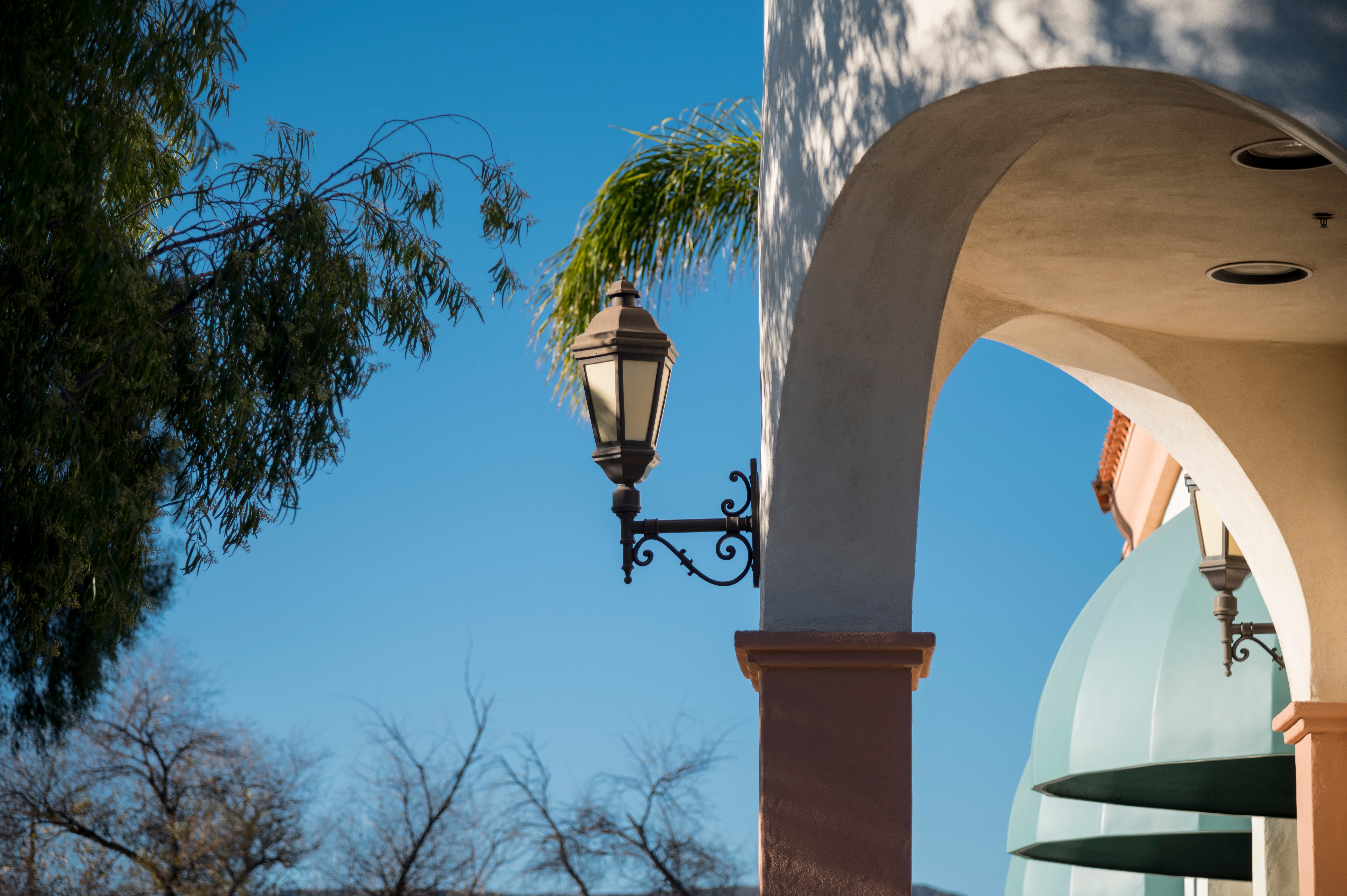 Exterior property photo showing a modern ceiling light fixture installed in a rental unit