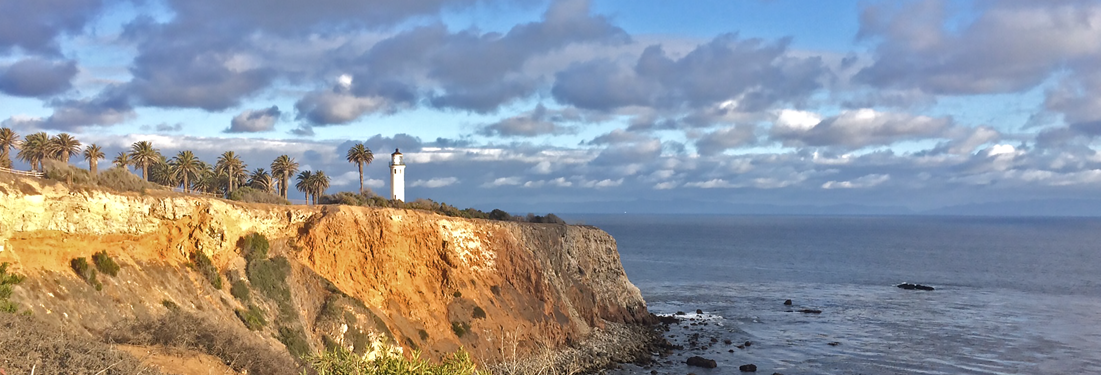 Peaceful waterfront view in Southern California representing Coastline Equity's values of equity, preparation, and community care.
